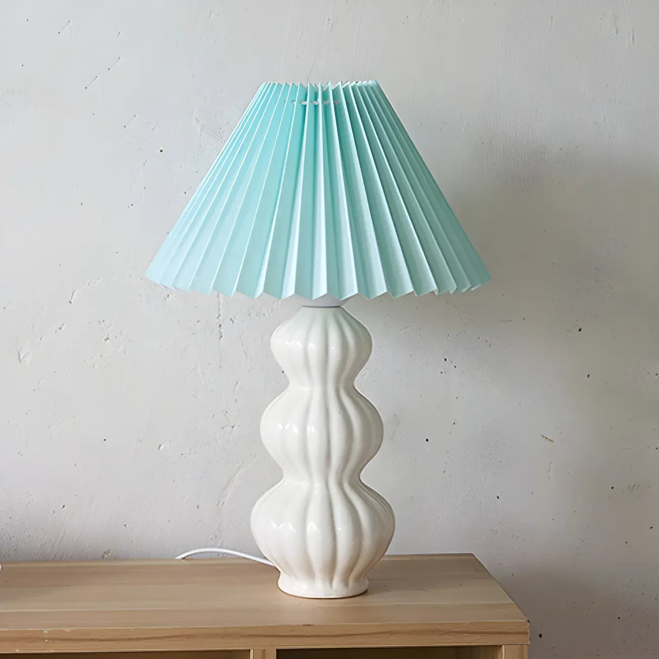 Lampe de table en céramique à abat-jour plissé de style nordique pour salon