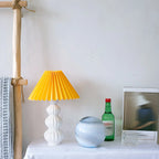 Lampe de table en céramique à abat-jour plissé de style nordique pour salon