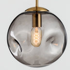 Suspension globe irrégulière en verre fumé pour chambre à coucher