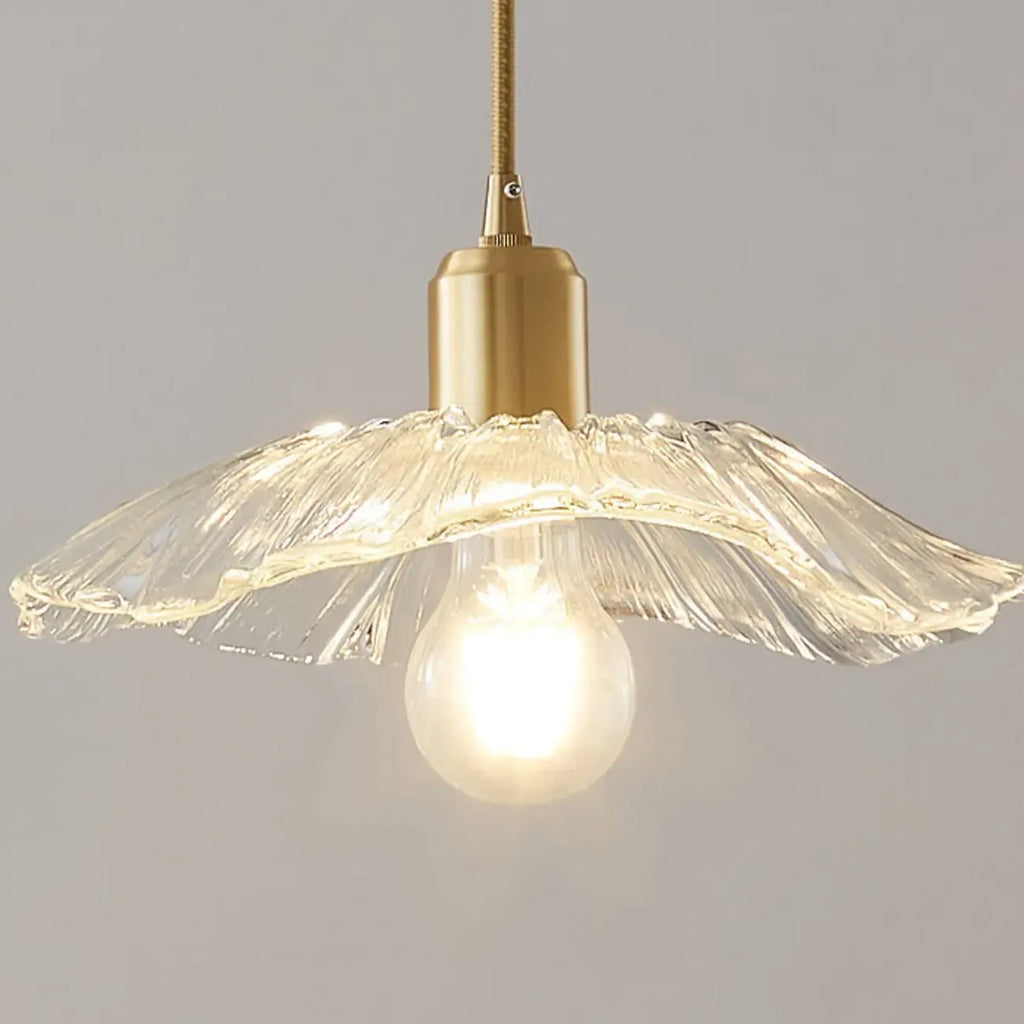 Suspension moderne en verre transparent avec motif marguerite et accessoires dorés