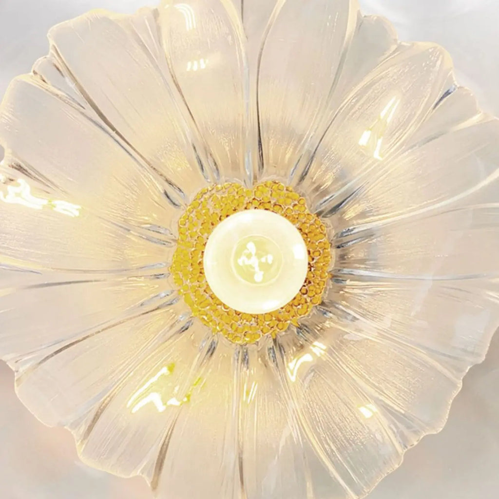 Suspension moderne en verre transparent avec motif marguerite et accessoires dorés