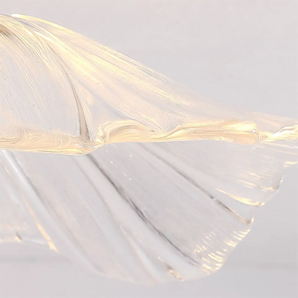 Suspension moderne en verre transparent avec motif marguerite et accessoires dorés