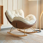 Fauteuil à bascule rembourré couleur crème avec repose-pieds pour salon