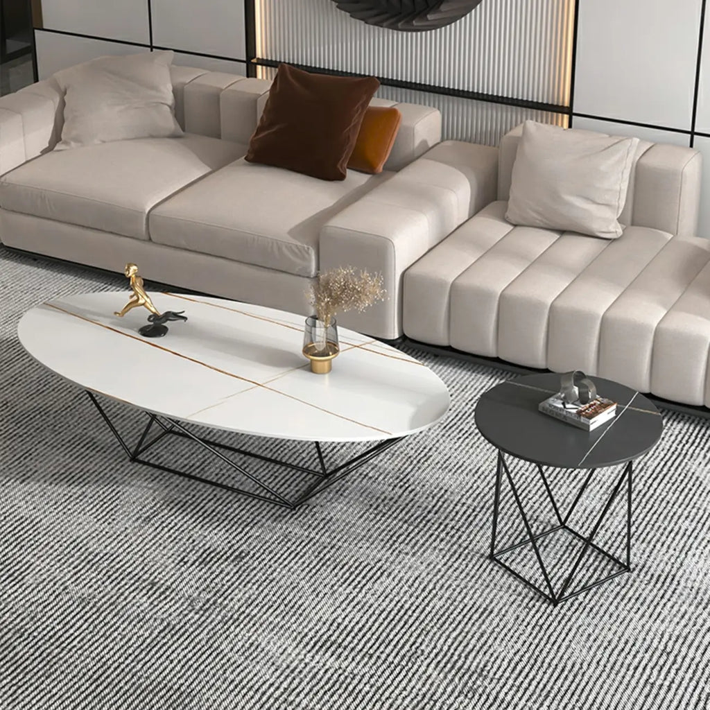 Table basse ovale élégante en métal noir avec piètement géométrique