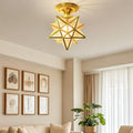 Plafonnier semi-encastré de style colonial avec abat-jour en verre doré en forme d'étoile