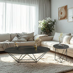 Table basse ovale élégante en métal noir avec piètement géométrique