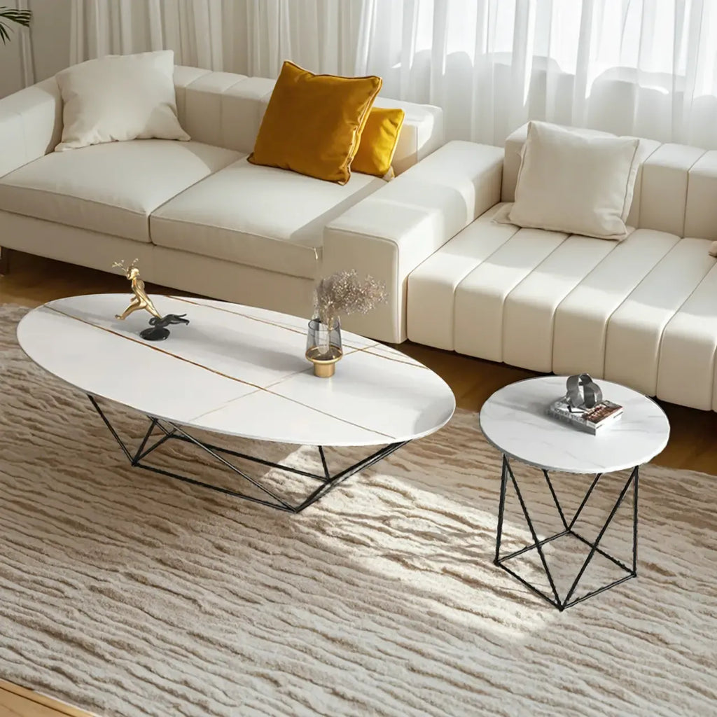 Table basse ovale élégante en métal noir avec piètement géométrique