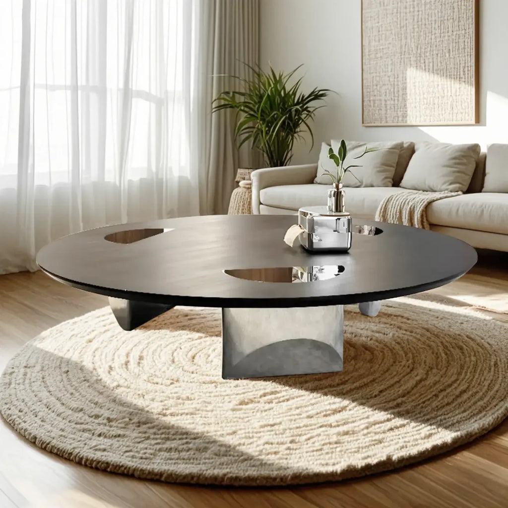 Table ronde Glam Wood noire avec piètement trépied abstrait