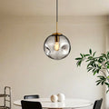 Suspension globe irrégulière en verre fumé pour chambre à coucher