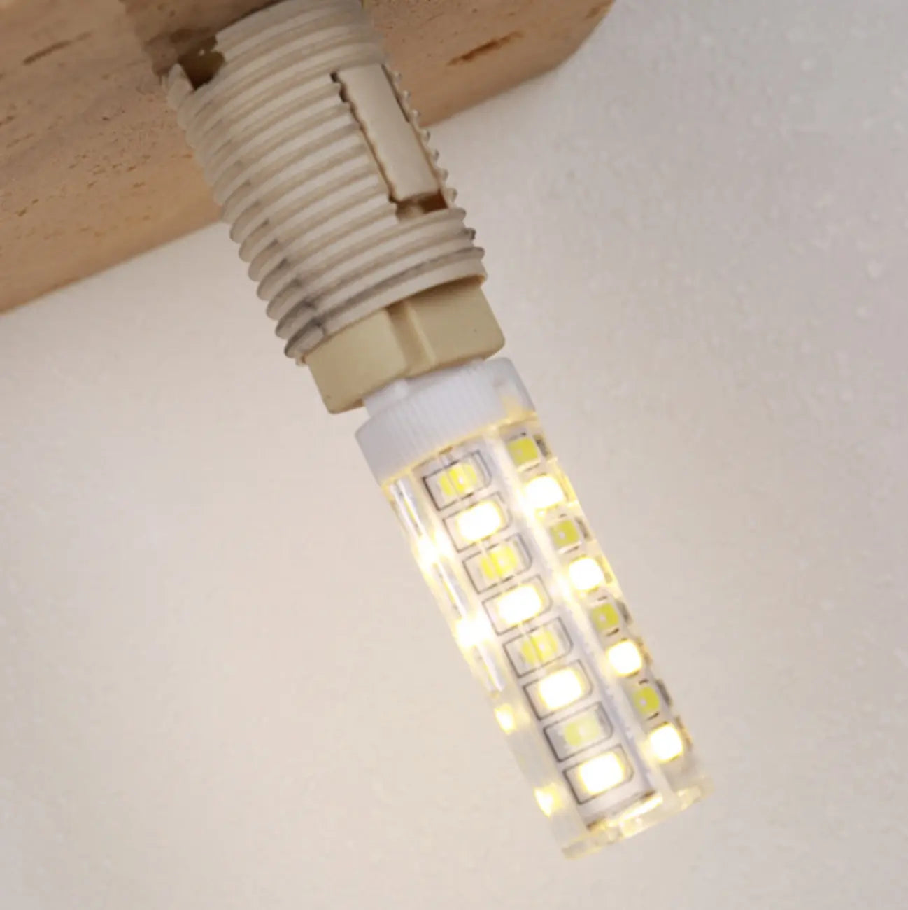 Applique murale moderne en pierre beige à lumière chaude