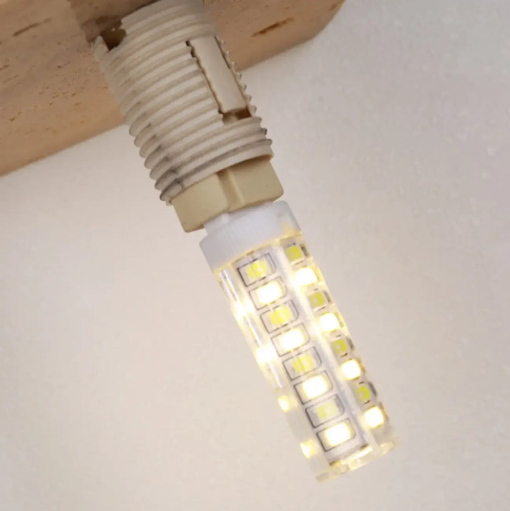 Applique murale moderne en pierre beige à lumière chaude