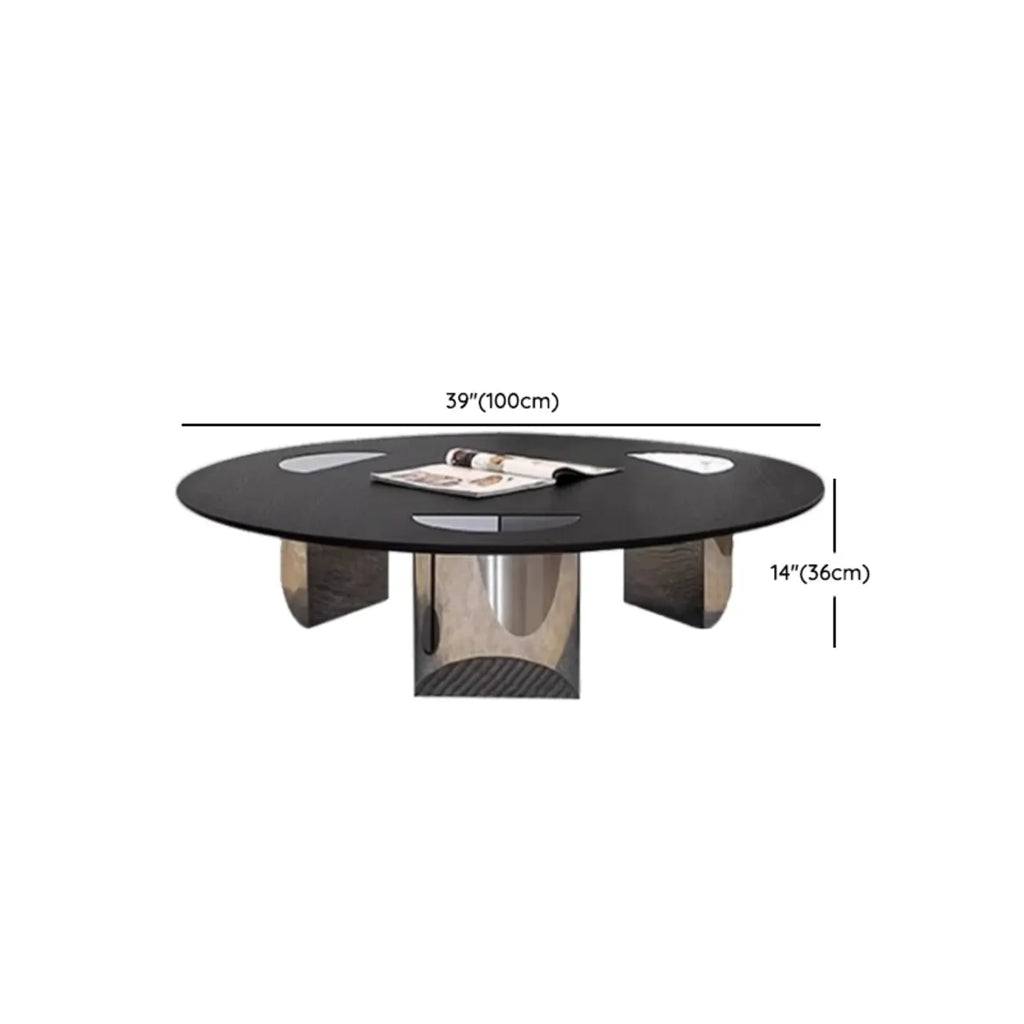Table ronde Glam Wood noire avec piètement trépied abstrait