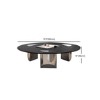 Table ronde Glam Wood noire avec piètement trépied abstrait