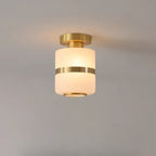 Plafonnier semi-encastré moderne en verre blanc et doré, style tambour.