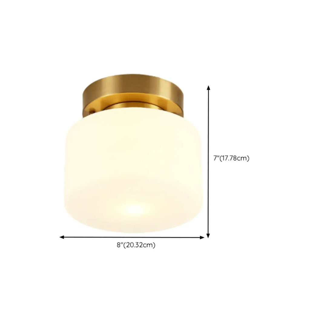 Plafonnier semi-encastré moderne en verre blanc et doré, style tambour.