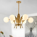 Lustre de luxe à 6 lumières, recouvert de feuilles d'or et orné de globes en verre