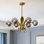Lustre de luxe à 6 lumières, recouvert de feuilles d'or et orné de globes en verre
