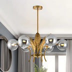 Lustre de luxe à 6 lumières, recouvert de feuilles d'or et orné de globes en verre