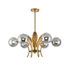 Lustre de luxe à 6 lumières, recouvert de feuilles d'or et orné de globes en verre