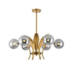 Lustre de luxe à 6 lumières, recouvert de feuilles d'or et orné de globes en verre