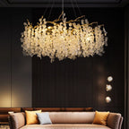 Lustre élégant suspendu en verre à branches dorées