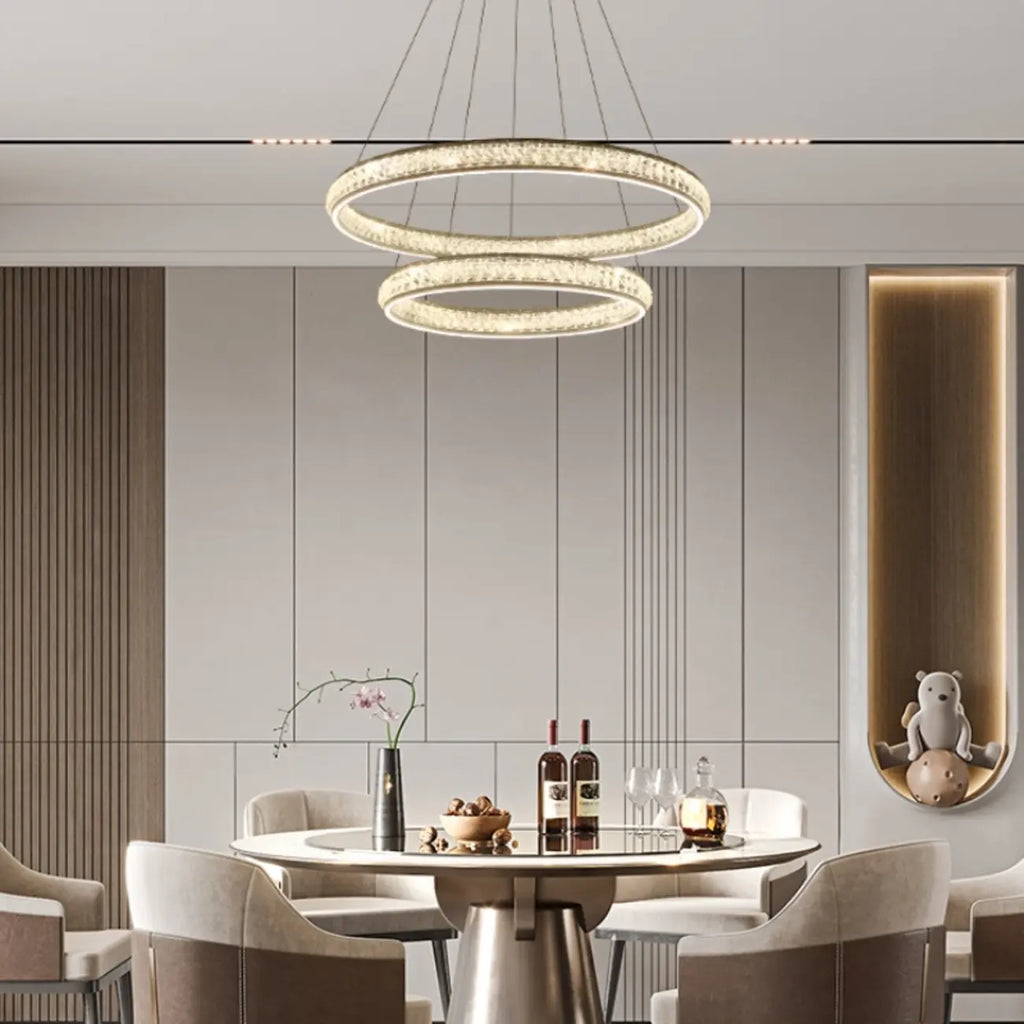 Lustre de luxe à anneaux dorés étagés en cristal et LED