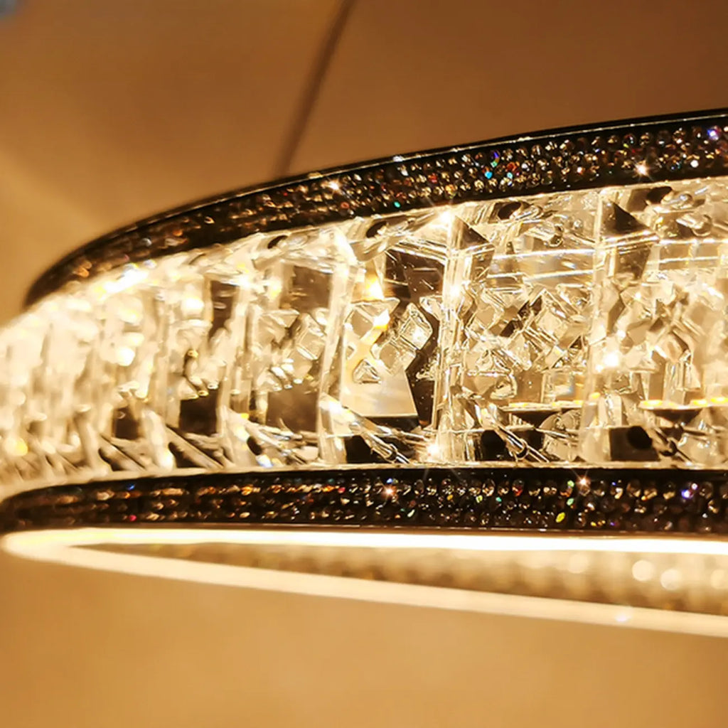 Lustre de luxe à anneaux dorés étagés en cristal et LED