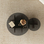 Table d'appoint ronde en verre brun avec piètement géométrique en X en bois