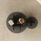 Table d'appoint ronde en verre brun avec piètement géométrique en X en bois
