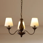Lustre traditionnel en métal brun et tissu, à 8 lumières.