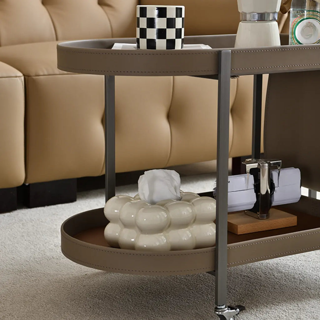 Table d'appoint pivotante ovale à deux niveaux avec plateau en similicuir pour salon