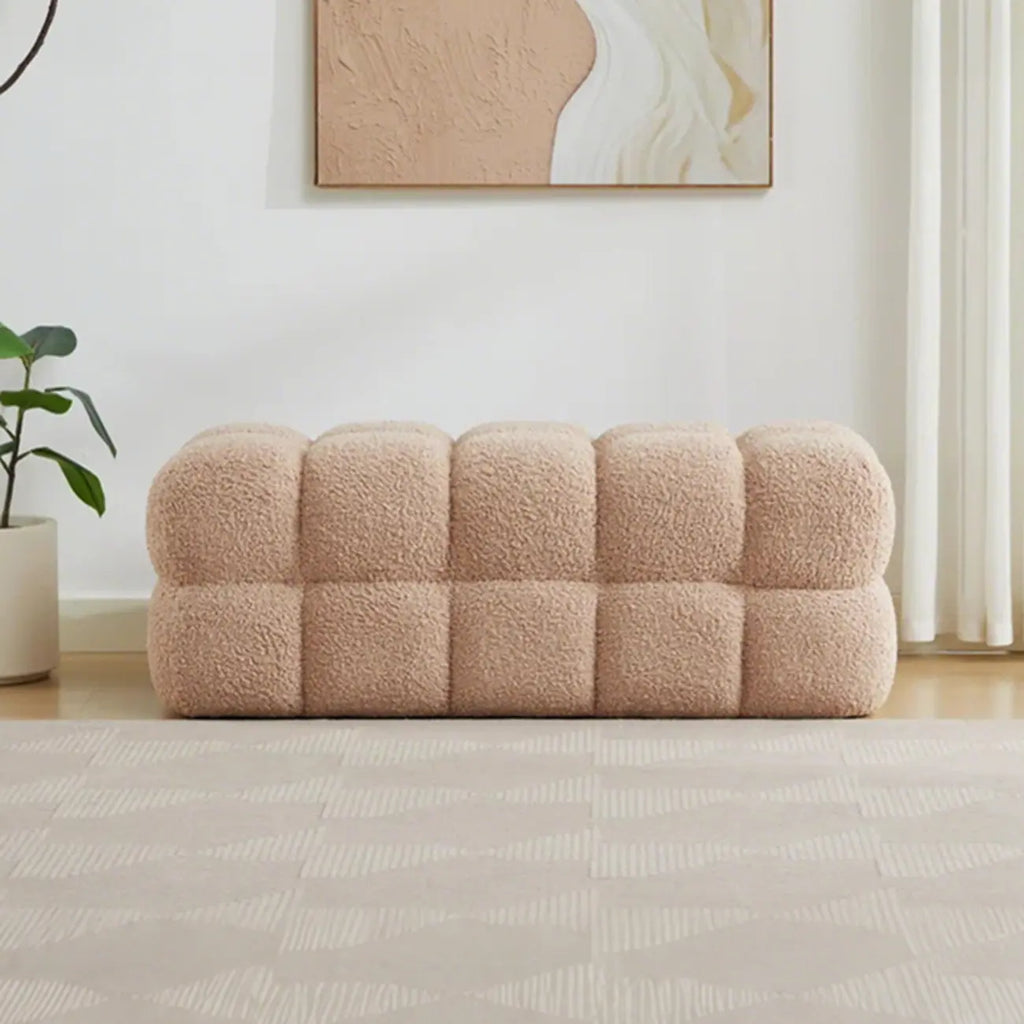 Banc de chambre moderne en forme de nuage, recouvert de tissu bouclé.