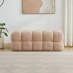 Banc de chambre moderne en forme de nuage, recouvert de tissu bouclé.