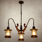 Lustre industriel en métal noir, lanterne en forme de roue.
