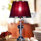 Lampe de table contemporaine en tissu rouge et pied en cristal