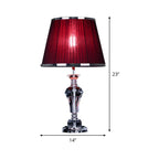 Lampe de table contemporaine en tissu rouge et pied en cristal