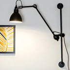 Applique murale à bras articulé en métal noir avec base en tréteau