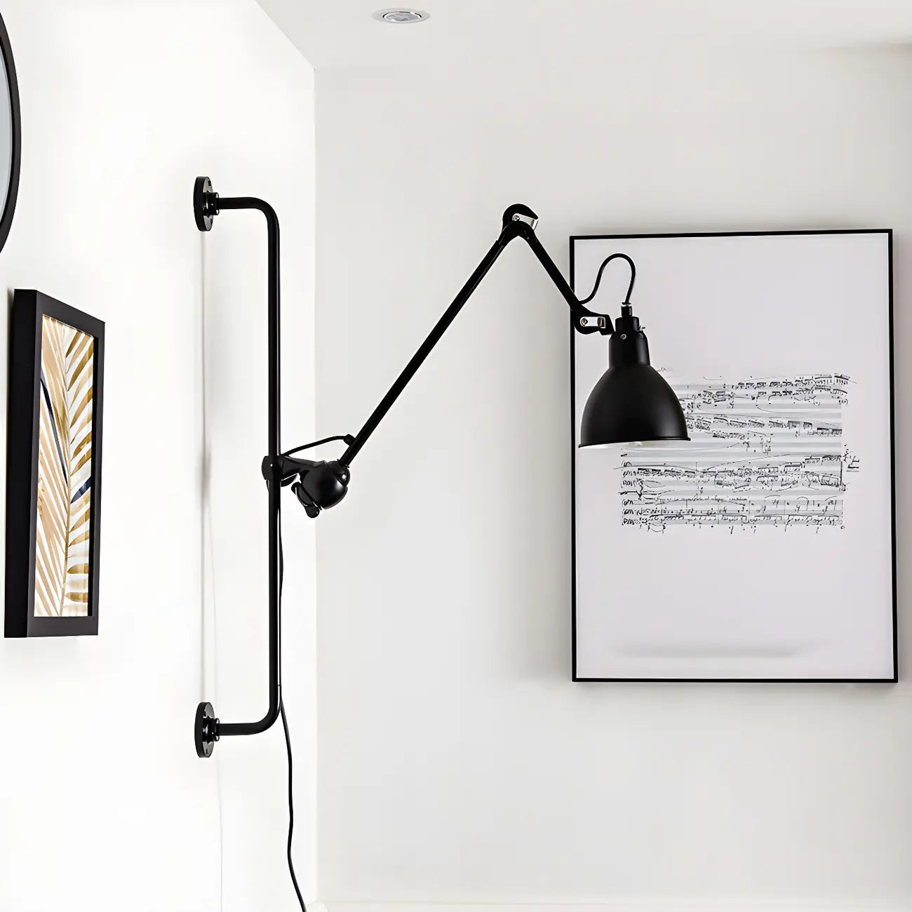 Applique murale à bras articulé en métal noir avec base en tréteau