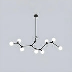 Lustre moderne à 8 lumières avec globe et branches noires, style îlot.