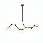 Lustre moderne à 8 lumières avec globe et branches noires, style îlot.