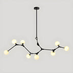 Lustre moderne à 8 lumières avec globe et branches noires, style îlot.