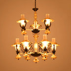 Lustre suspendu vintage en forme de lanterne dorée à 9 lumières, en verre côtelé transparent, avec un design à 2 niveaux.