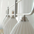 Suspension îlot moderne et simple en céramique à plusieurs lumières