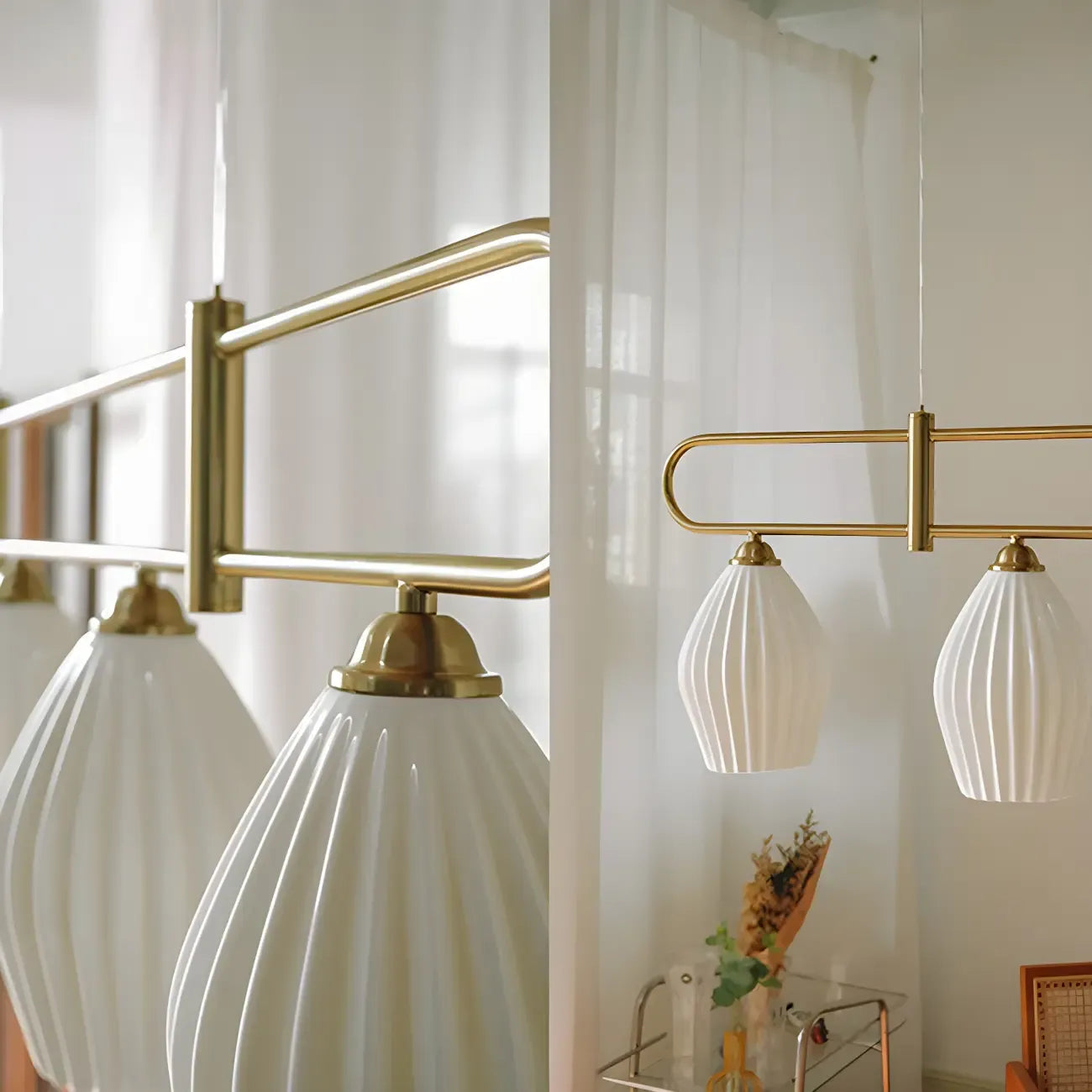 Suspension îlot moderne et simple en céramique à plusieurs lumières