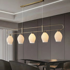 Suspension îlot moderne et simple en céramique à plusieurs lumières