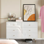 Commode moderne en bois blanc avec poignées dorées