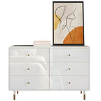 Commode moderne en bois blanc avec poignées dorées