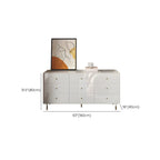 Commode moderne en bois blanc avec poignées dorées