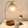 Lampe de table exquise en verre brun à bras courbé en forme de fleur