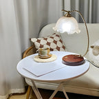 Lampe de table exquise en verre brun à bras courbé en forme de fleur